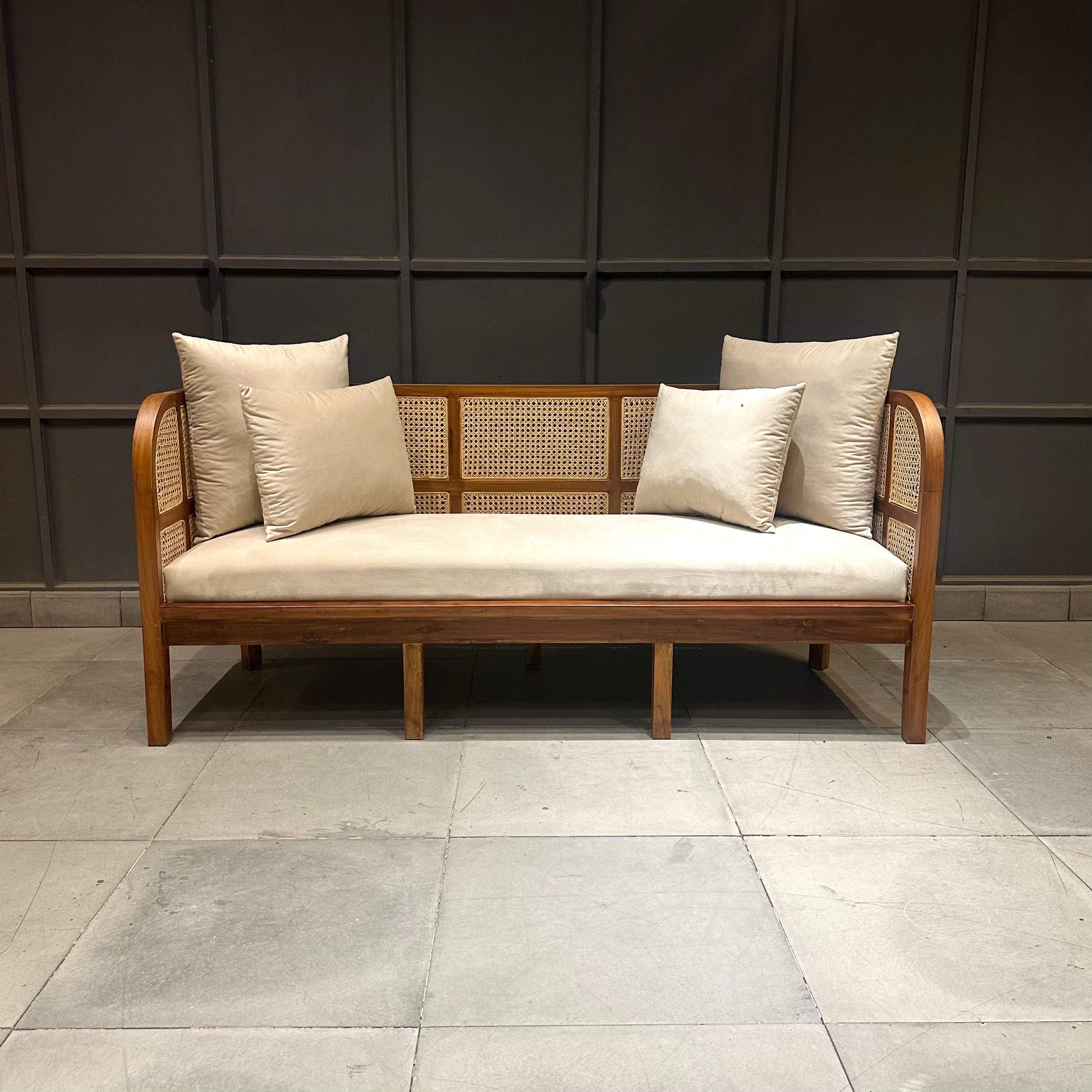 Hand weaved cane sofa in solid wood