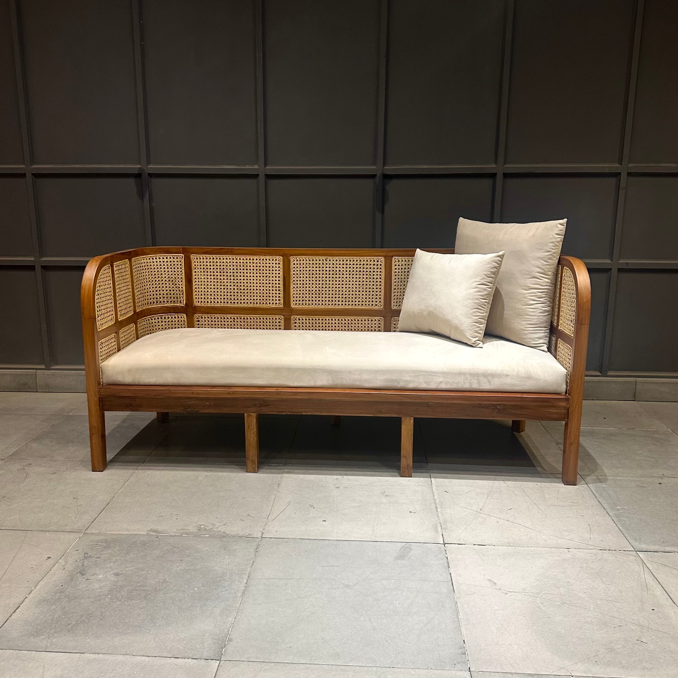 Hand weaved cane sofa in solid wood